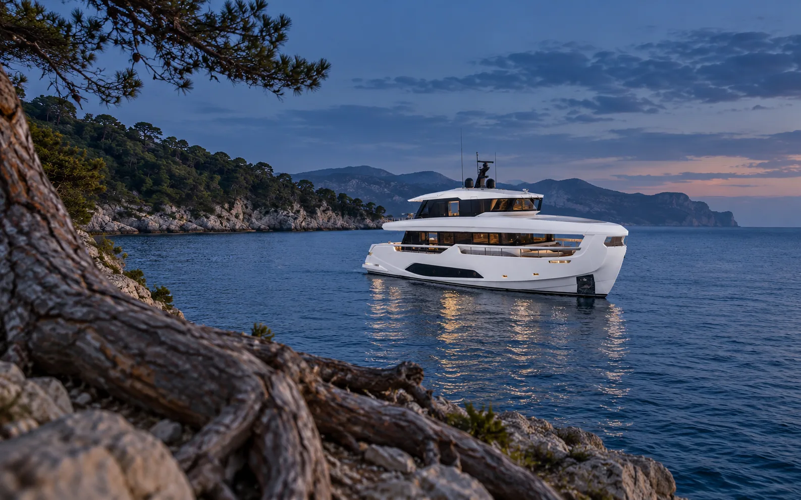 Ferretti INFYNITO 90 seen from the stern quarter at blue hour