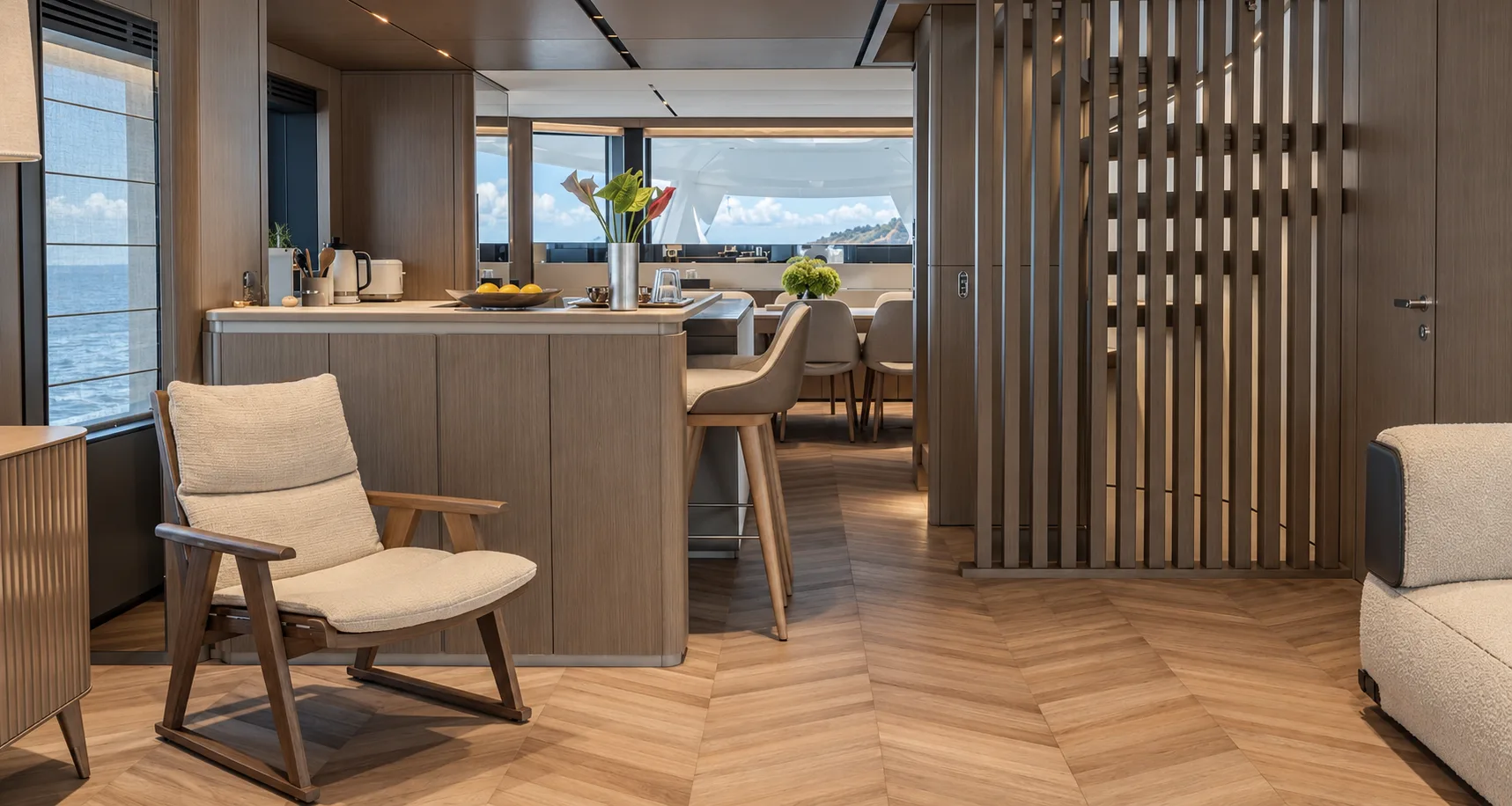 Saloon armchair with the galley counter and the slatted screen beyond
