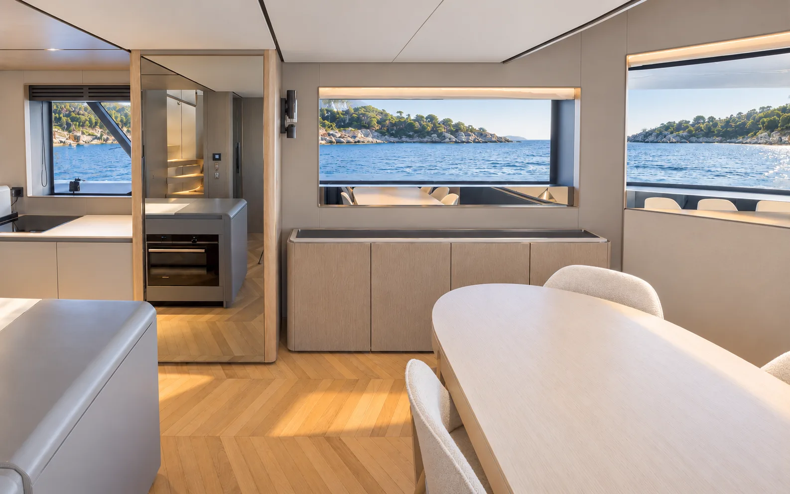 Galley counter and dining table, with windows on both sides