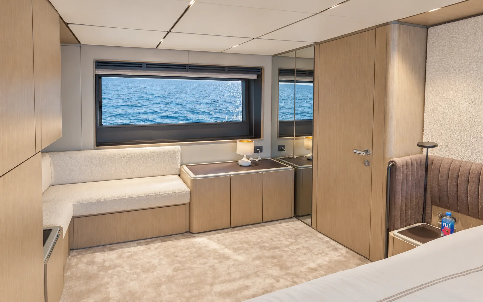 Sofa beneath the hull window in the owner’s suite