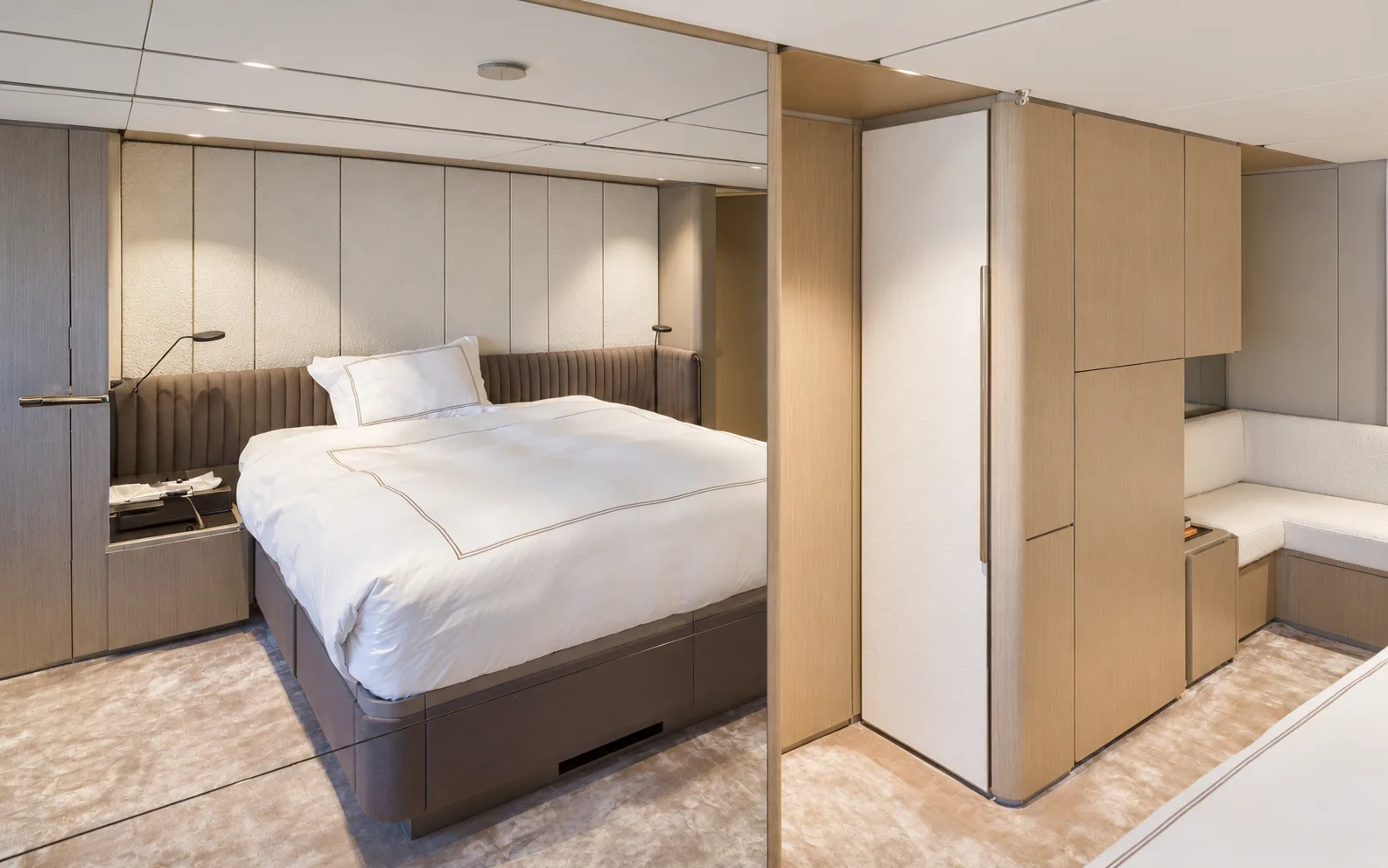 Double cabin with a wardrobe beside the bed