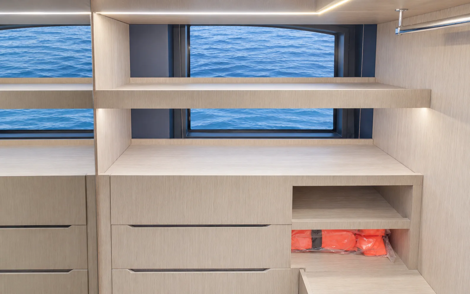 Shelves beneath a hull window