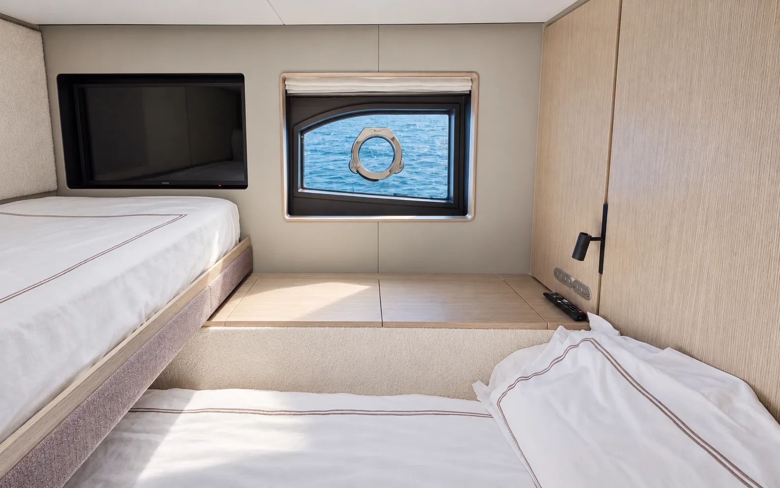 Cabin with a berth below a porthole