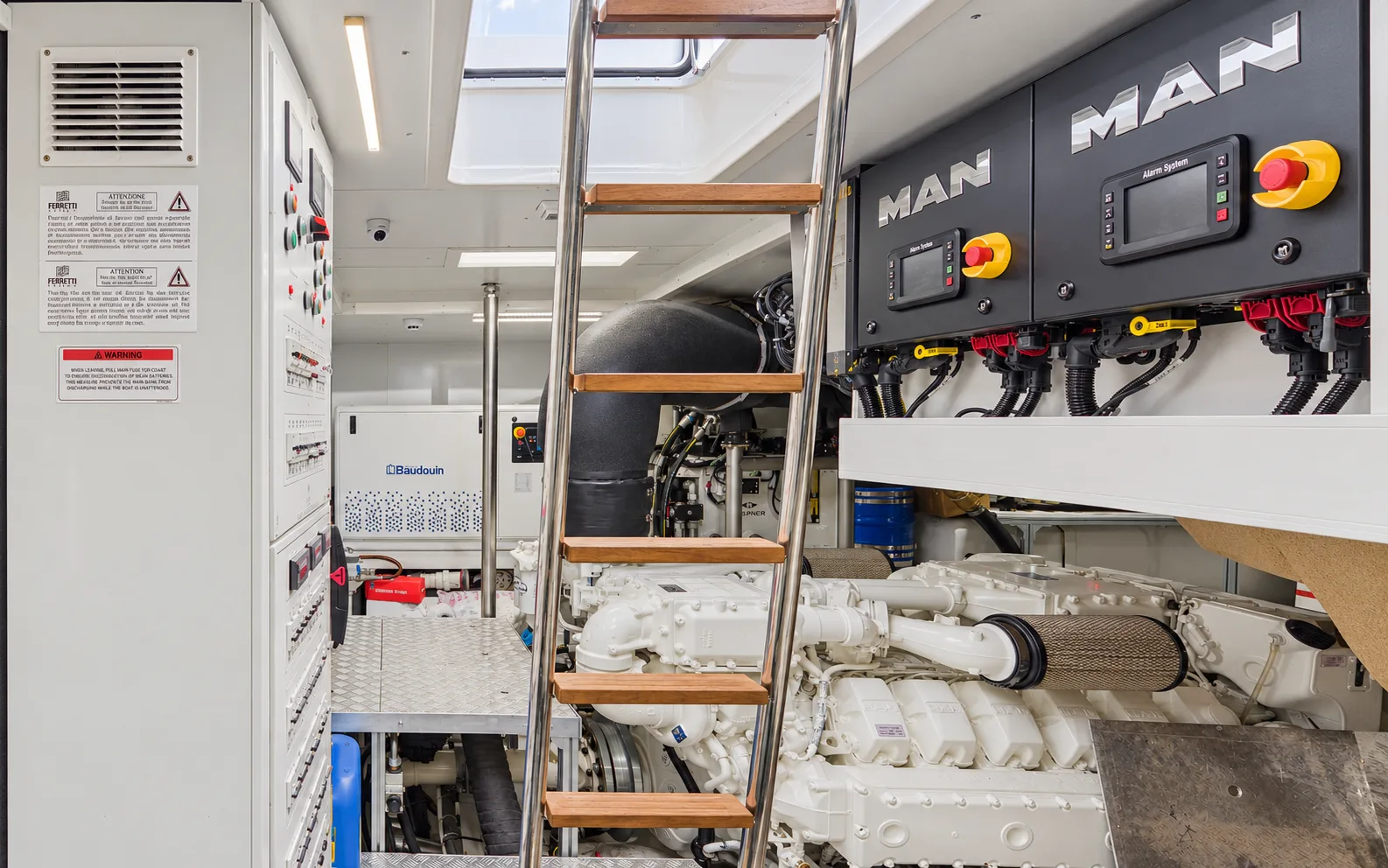 Engine room with the MAN control panels and the ladder